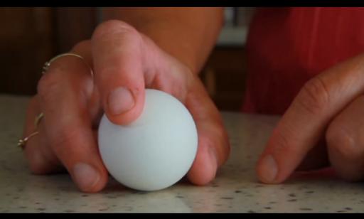 How do you peel a hard-boiled egg?